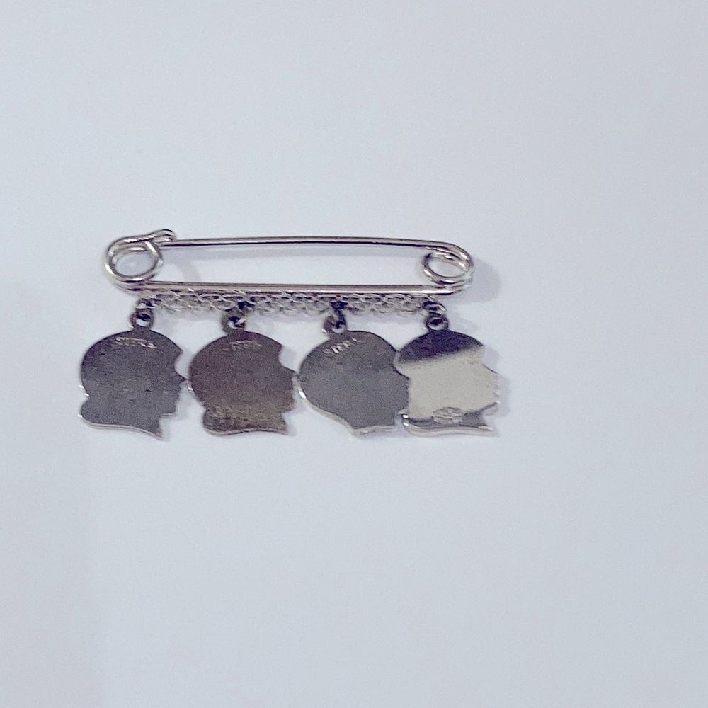 Vintage child head sterling brooch